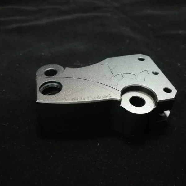 Precision-CNC-Machining-service-Aluminum-Timing-Chain-Tensioner-Housing-scaled